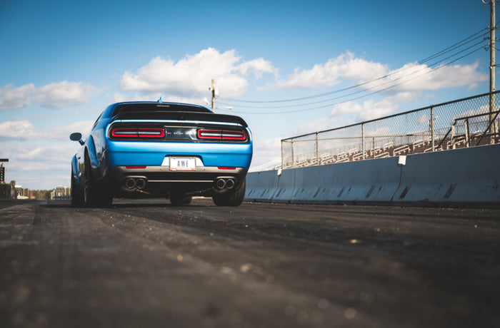 AWE Tuning 2015+ Dodge Challenger 6.4L/6.2L SC Track Edition Exhaust - Quad Chrome Silver Tips available at Damond Motorsports